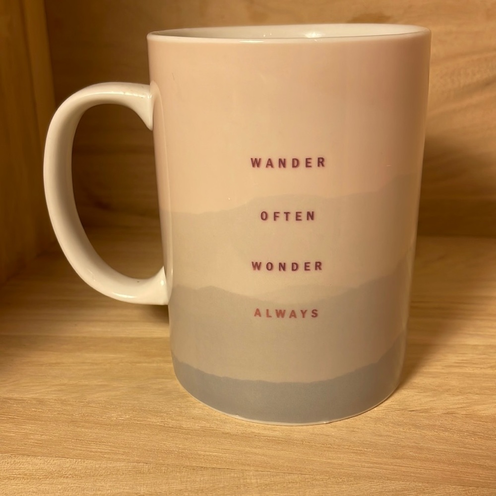 Mug with inspiration: “wander often wonder always”